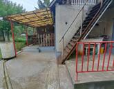 Eladó csendes, panorámás telek házzal és melléképületekkel!