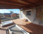 Szomód csendes zsákutcájában felújított és bővített családi ház eladó