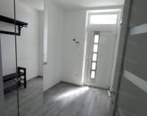 Újszerű, nívós családi házban a központban