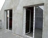 Központközeli új otthon pici kerttel