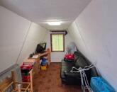 Oroszlányon a Harcsa utcában eladó lakhatásra alkalmas zártkert!