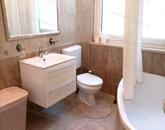 Eladó kertkapcsolatos földszinti lakás Alsóörsön!