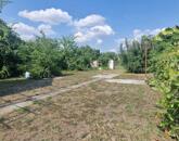 Cegléden 1329 m²-es telek gazdasági épülettel eladó!