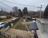 Oroszlányon a Harcsa utcában eladó lakhatásra alkalmas zártkert!