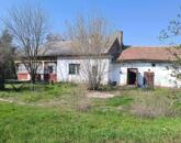 Cibakháza központjában felújítandó családi ház nagy portával eladó