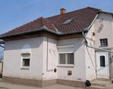 Eladó Kétpón egy 4 szobás 116m2-es tetőteres családi ház + csarnok