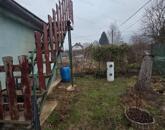 Oroszlányon a Harcsa utcában eladó lakhatásra alkalmas zártkert!