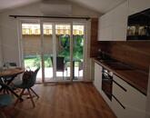 Alsóörsön közvetlen vízparti, felújított horgászház eladó