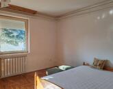 Eladó kétszintes családi ház külön lakrésszel Szolnok-Szandaszőlősön!