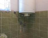 Törökszentmiklós központi részén eladó kertes családi ház!