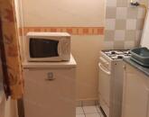 Eladó Szolnok belvárosi garzonlakás!