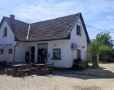 Eladó családi ház üzlethelyiséggel, garázzsal Szandaszőlősön