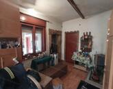 Újszászon eladó egy 104 nm-es 2 szobás részben felújított családi ház