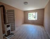 Eladó téglaépítésű, kertkapcsolatos 73nm-es lakás Tata központjában!