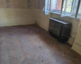 Szolnokon eladó felújítandó kertes családi ház!