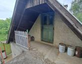 Eladó csendes, panorámás telek házzal és melléképületekkel!