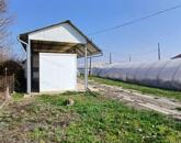 Eladó Tiszaföldváron egy 3718 m2-es telek hűtőházzal.