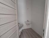 Eladó téglaépítésű, kertkapcsolatos 73nm-es lakás Tata központjában!