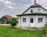Tiszaföldváron Fő út  melletti 3 szoba + nappalis Családi ház Eladó