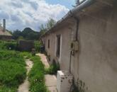 Eladó Környe központjában egy 2852 nm-es, összközműves építési telek