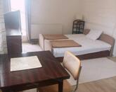 Eladó kertkapcsolatos első emeleti lakás Alsóörsön