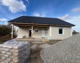 Eladó családi ház Kozármisleny 90 000 000 Ft