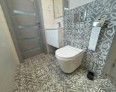 Újszerű, nívós családi házban a központban