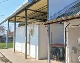 Eladó Tiszaföldváron egy 3718 m2-es telek hűtőházzal.