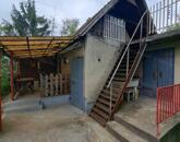 Eladó csendes, panorámás telek házzal és melléképületekkel!