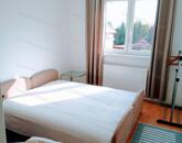 Eladó kertkapcsolatos első emeleti lakás Alsóörsön