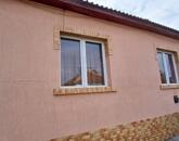 Eladó Szolnokon két épületből álló, 111 m2-es családi ház